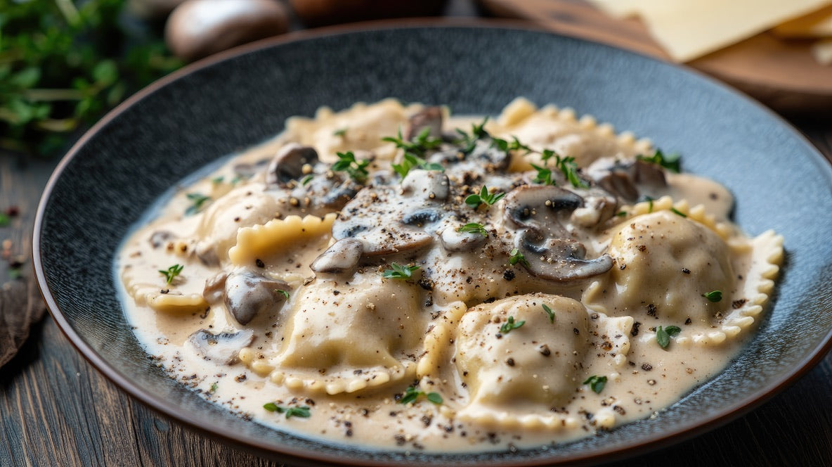Creamy mushroom ravioli topped with fresh herbs and seasoned with SwissAm Pepper Mélange.