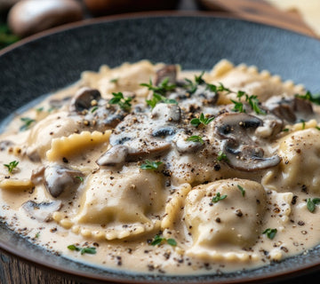 Creamy mushroom ravioli topped with fresh herbs and seasoned with SwissAm Pepper Mélange.